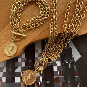 brushed gold double layered single coin bracelet.